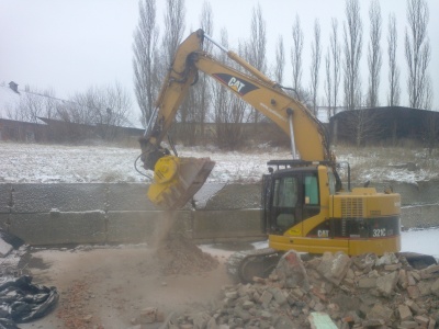 BC 2250 drtič Atlas Copco na stroji CAT